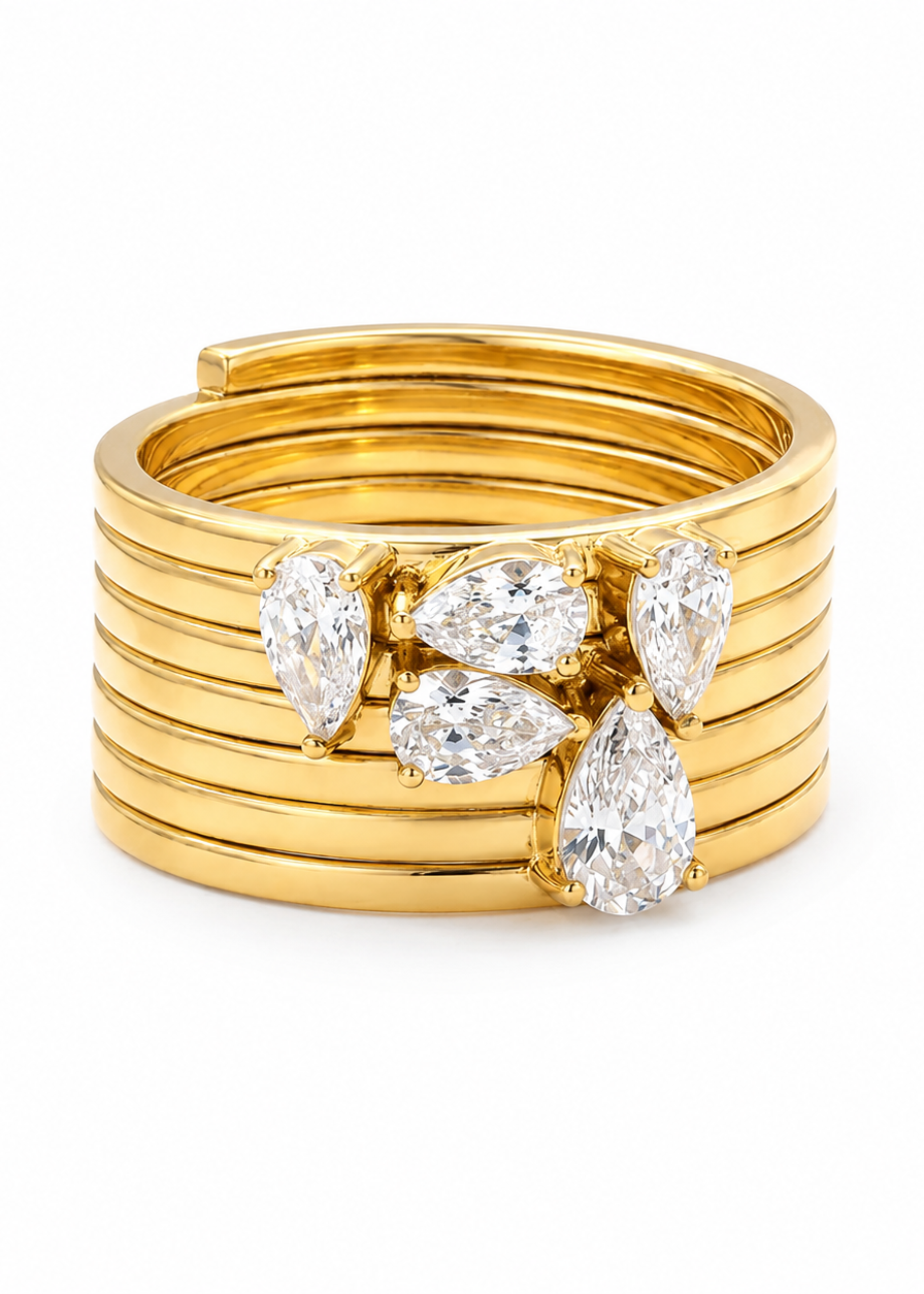 A gold-plated multi-band ring featuring a cluster of pear-cut clear gemstones in the center, set against a plain white background.